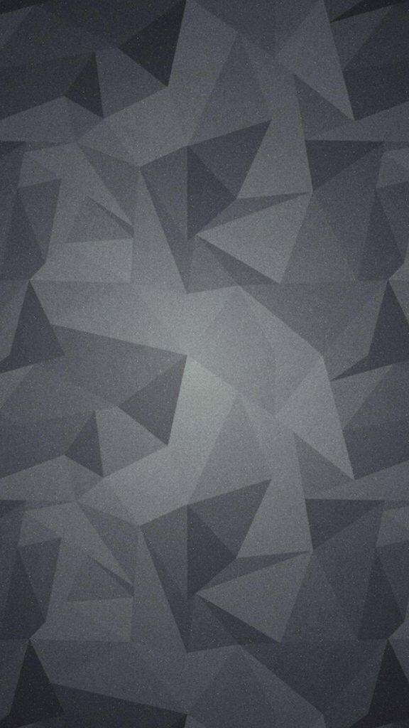 Glowing Illumination of Abstract Polygonal Artistry: A Captivating Wallpaper for Black and Grey iPhone Background