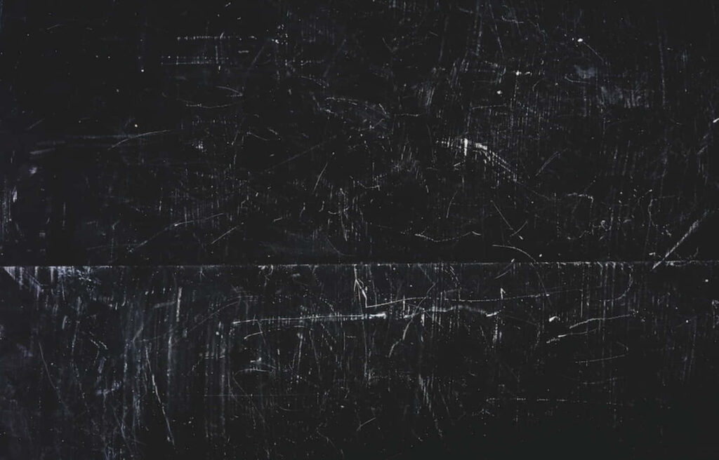 Abstract Black Texture Wallpaper: Gritty Industrial Background Design