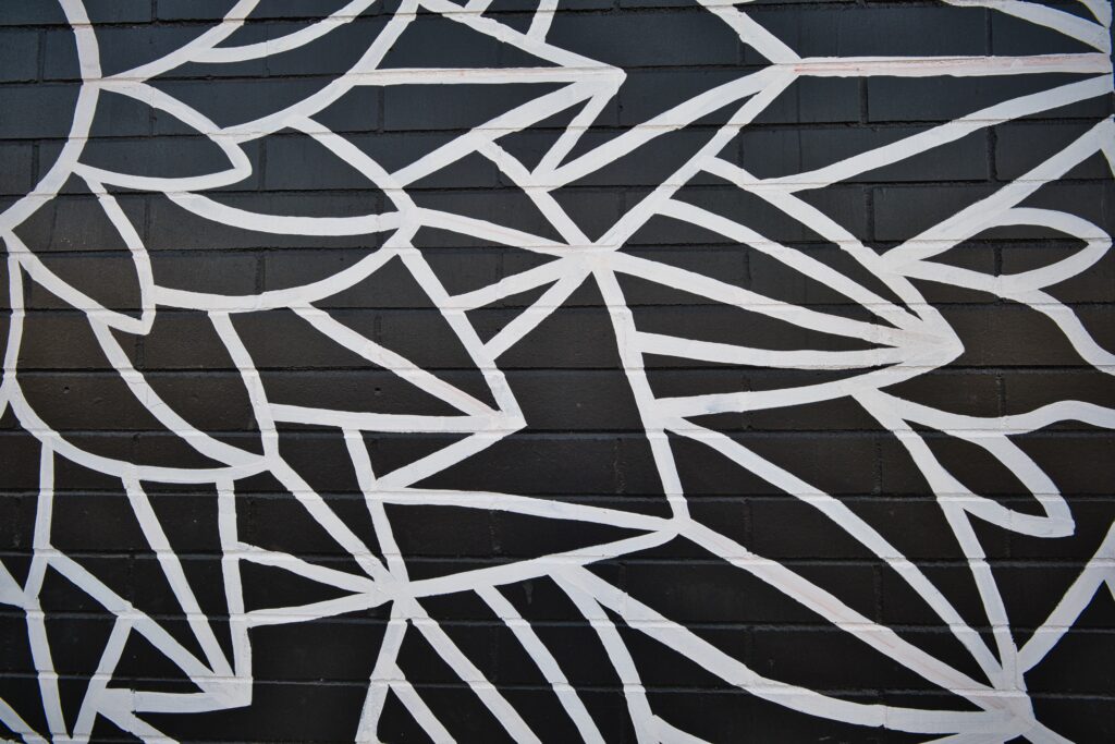 Abstract Black Wallpaper with Bold White Geometric Shapes