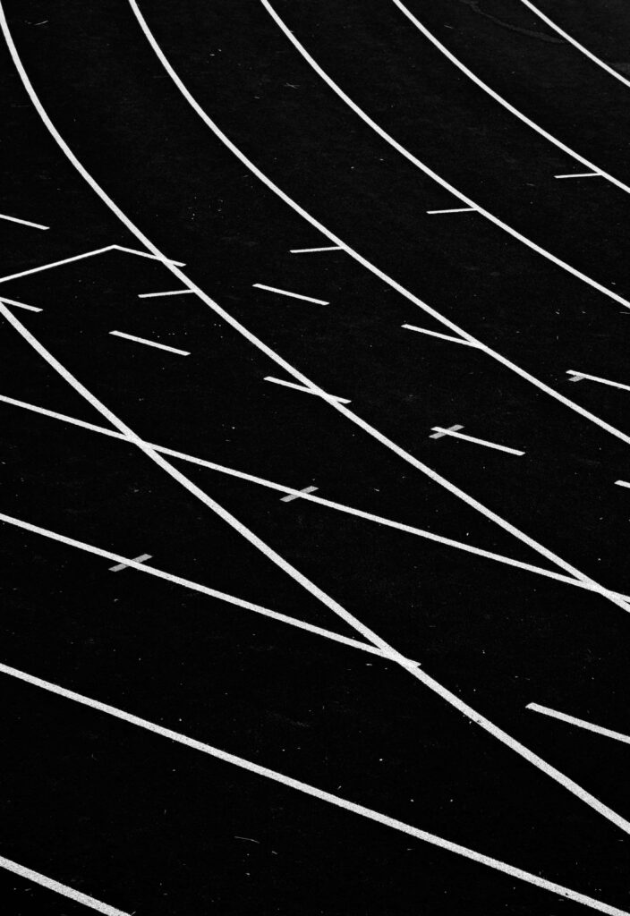 Modern Abstract Wallpaper: Sleek White Lines on Black Background