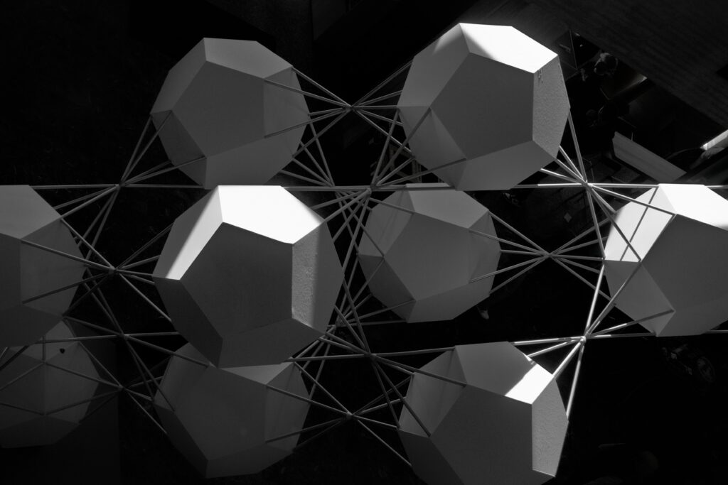 Intricate Black and White Geometric Wallpaper with Crystal Design