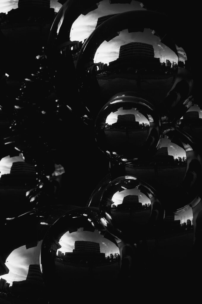 Urban Reflection: Black and White Wallpaper with Bubbles & Shadows