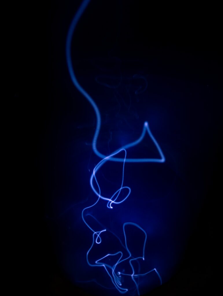 Blue Neon Light Abstract Wallpaper - Fluid Energy on Dark Background