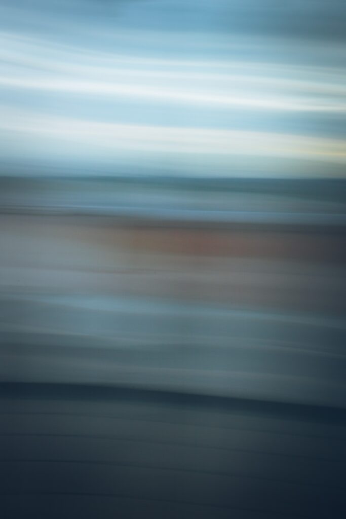 Abstract Blue and Gray Wallpaper: Blurred Stripes Creating Motion