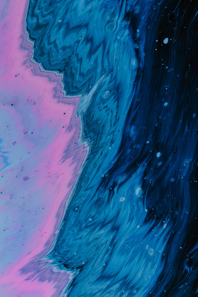 Dynamic Blue and Pink Abstract Wallpaper with Fluid Texture