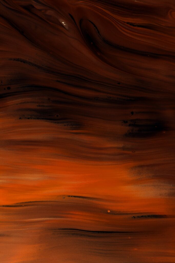 Dynamic Abstract Wallpaper with Brown & Orange Fluid Streaks