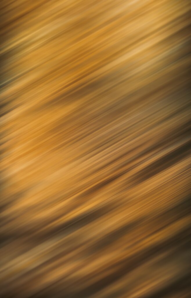 Warm Earthy Brown Abstract Wallpaper with Diagonal Blurred Streaks