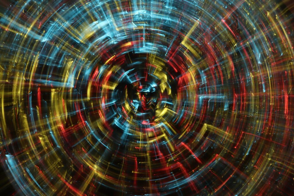Abstract Colorful Lights Wallpaper: Dynamic Rotational Pattern Background