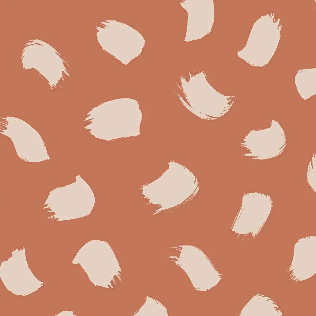 Abstract Cream Splatters on Warm Tan Background Wallpaper