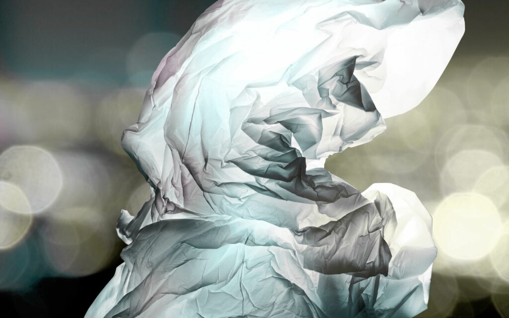 Abstract Crumpled White Paper Wallpaper with Stunning Bokeh Background