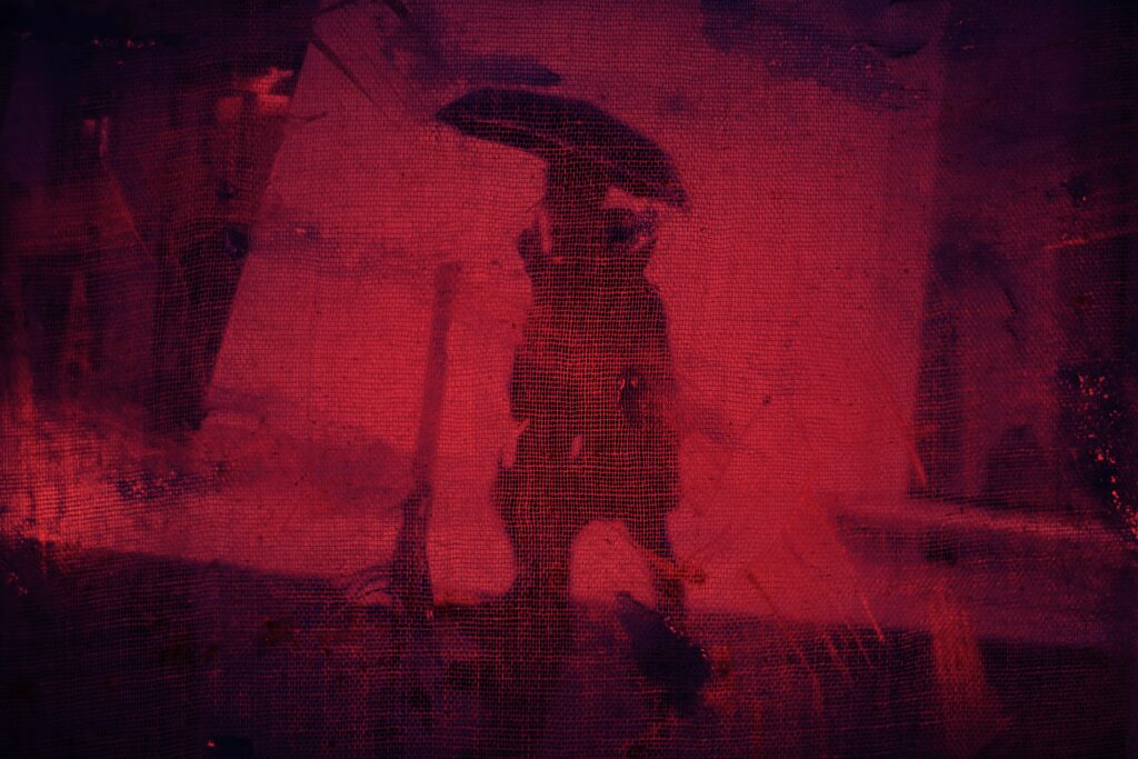 Abstract Dark Red Wallpaper with Silhouetted Umbrella in Textured Design