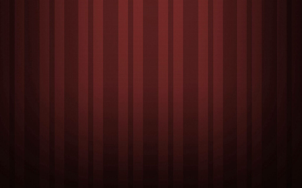 Harmonious Intricacy: A Captivating Red Wallpaper Featuring Vertically Adjacent Lines