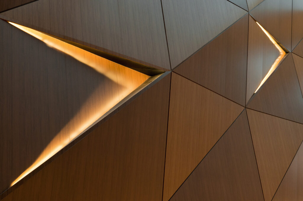 Abstract Geometric Wallpaper: Rich Brown Panels & Light Play