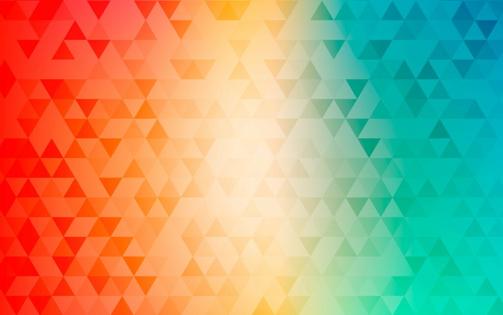 Vibrant geometric triangle pattern with warm red to cool blue gradient digital wallpaper background