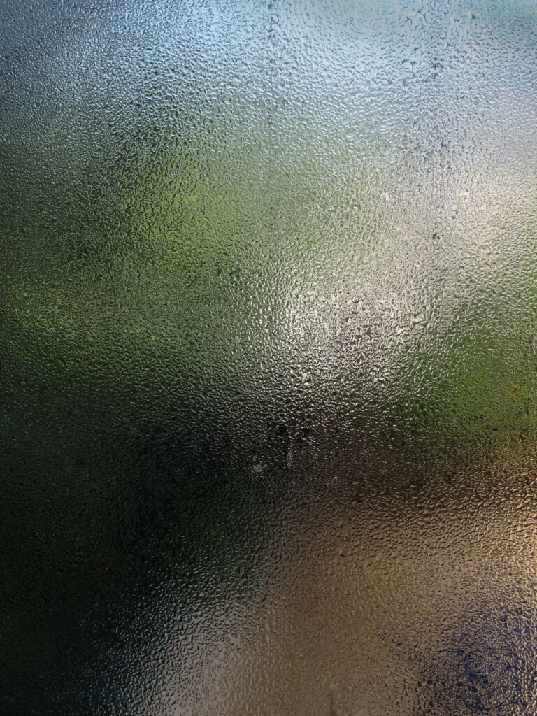 Textured Abstract Glass Wallpaper: Soft Green & Blue Blurred Design