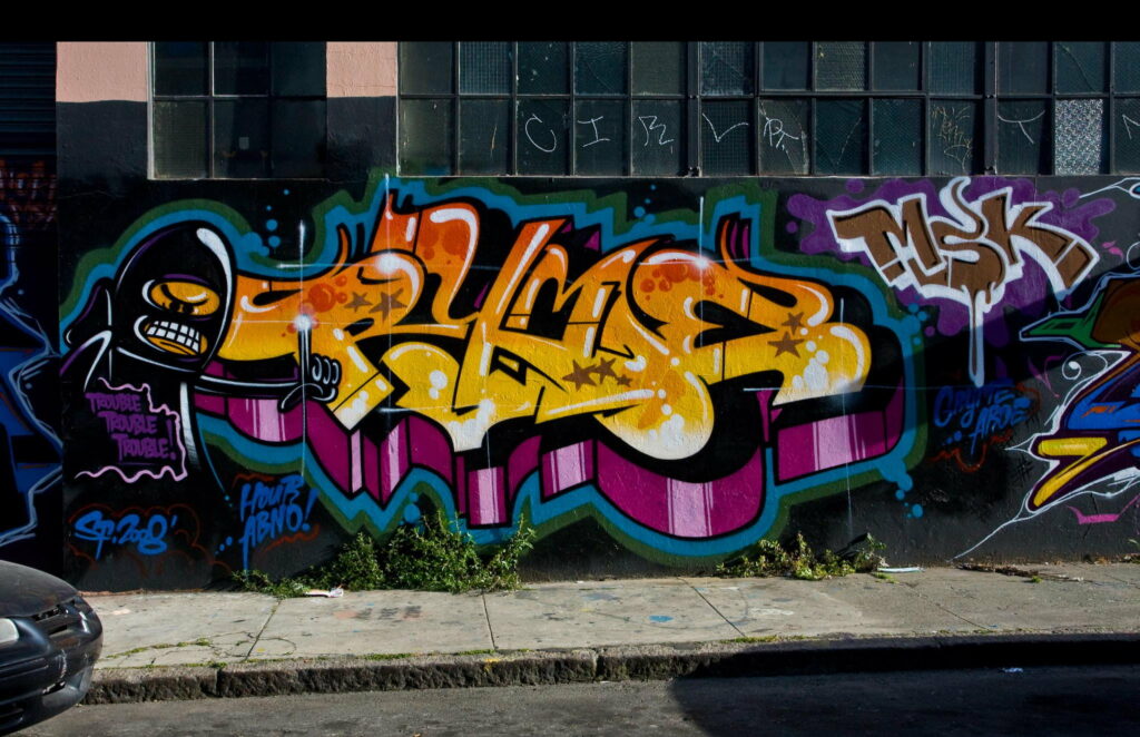 Vibrant Street Canvas: Abstract Graffiti Burst in HD Wallpaper Art
