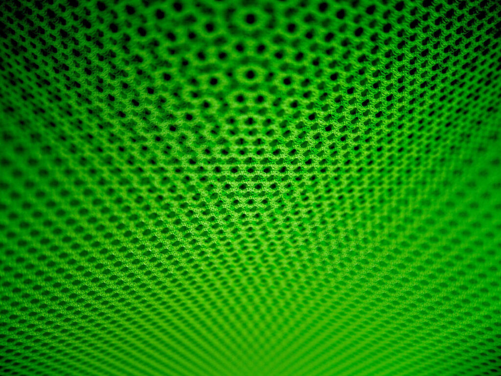 Abstract Green Halftone Texture: Dynamic Dot Gradient Background Wallpaper