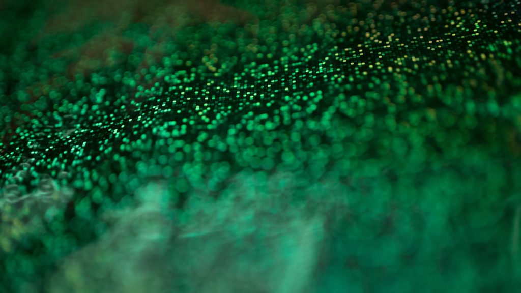 Abstract green holographic wallpaper with micro-grid pattern and glowing bokeh tech background