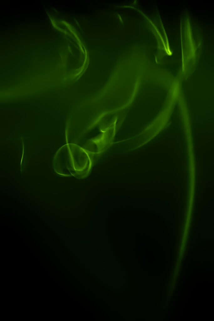 Abstract Green Lines Wallpaper: Ethereal Design on Dark Background