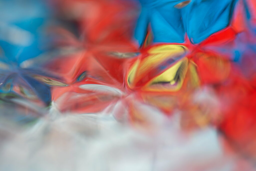Chromatic Abstractions: Multicolored Blur of Paint Wallpaper