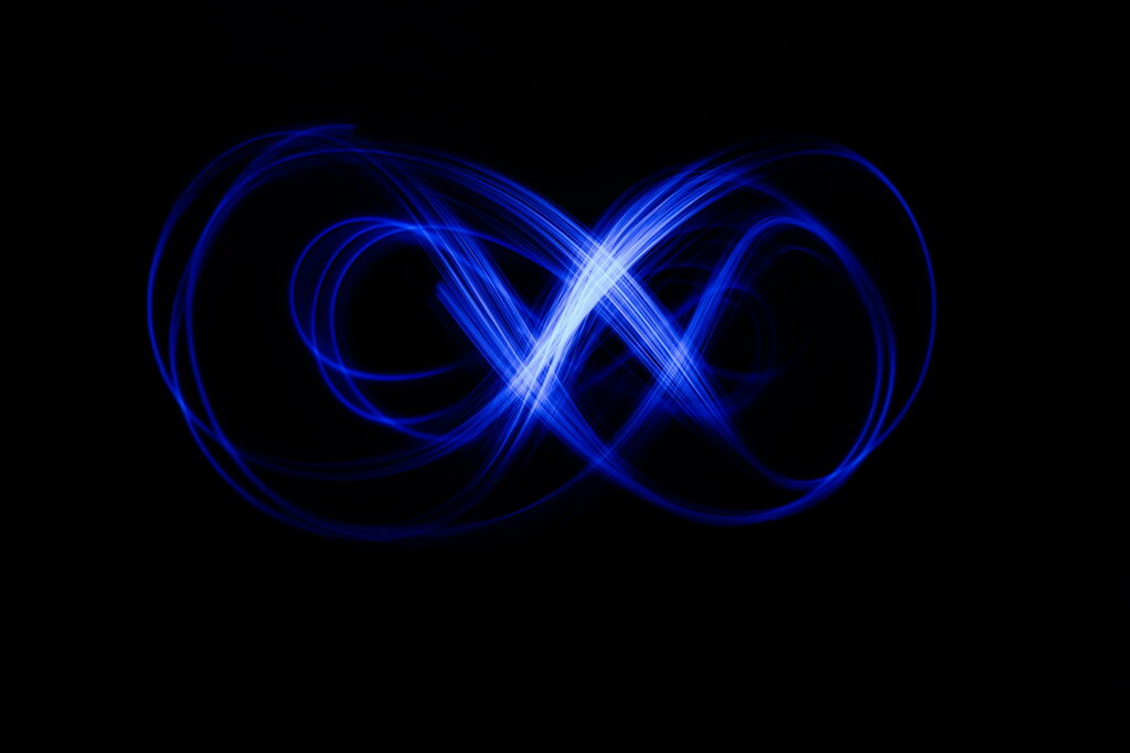 Blue Glow: Mesmerizing Abstraction in Long Exposure Neon Lights - Strikingly Beautiful 5K Wallpaper