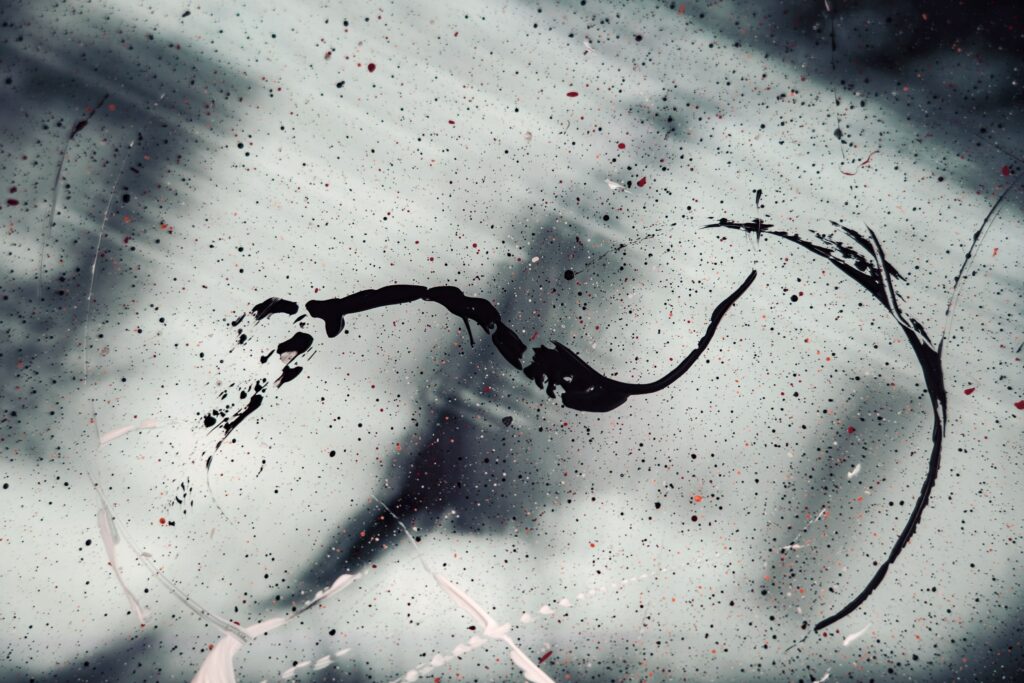 Modern Abstract Wallpaper: Paint Splatters on Glass Surface