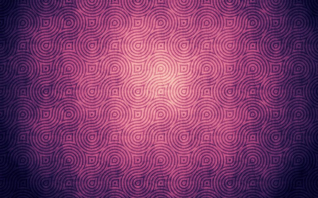 Abstract digital wallpaper with vibrant pink and purple interlocking circles and soft glow