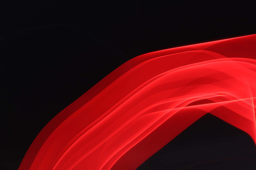 Modern Abstract Red Wave Gradient Wallpaper on Dark Background