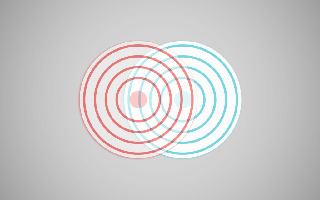Abstract Overlapping Target Patterns Wallpaper - Red & Blue Design
