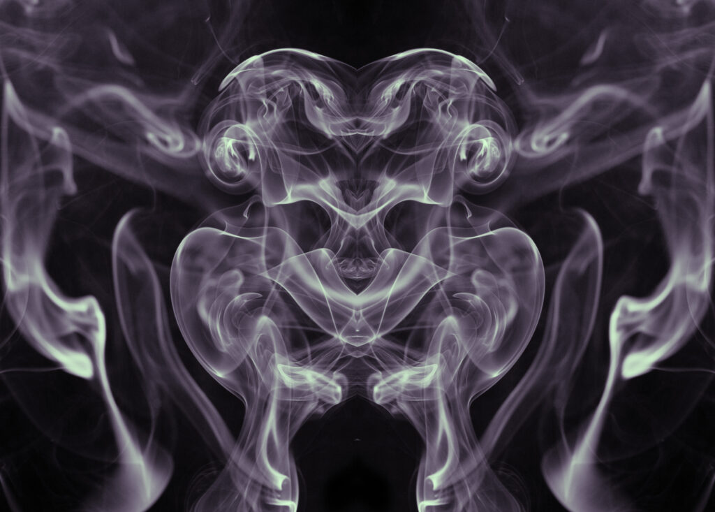 Mesmerizing Smoke Tendrils Wallpaper: Ethereal Dark Background Design