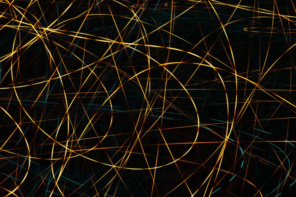 Dynamic Abstract Wallpaper: Intricate Golden & Blue Line Pattern