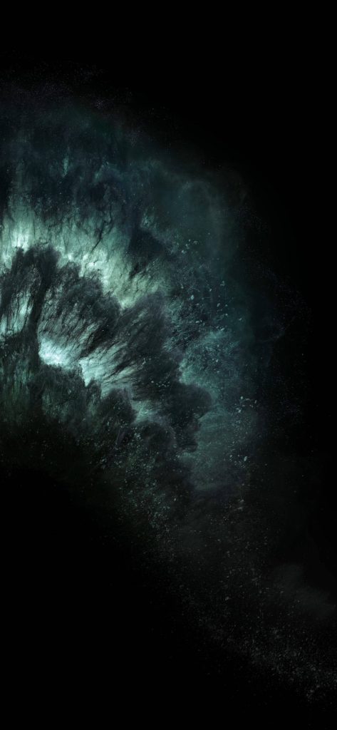 iPhone 11 Pro wallpaper with deep teal green dust particles on black background abstract design