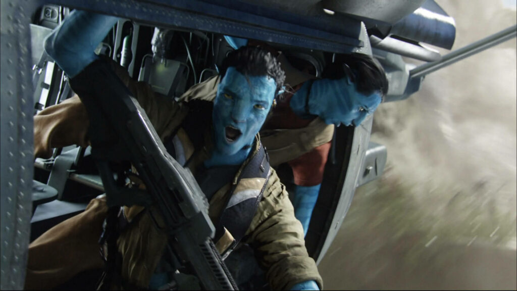 Avatar Wallpaper: Jake Sully in Epic Action Scene Background