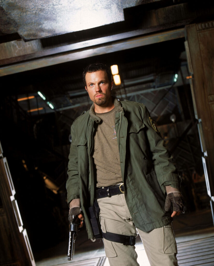 Adam Baldwin as Jayne Cobb in Firefly wallpaper showcasing rugged adventurous spirit
