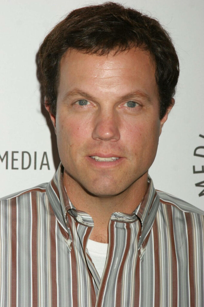 Close-up portrait of Adam Baldwin in striped shirt with light background confident expression Wallpaper