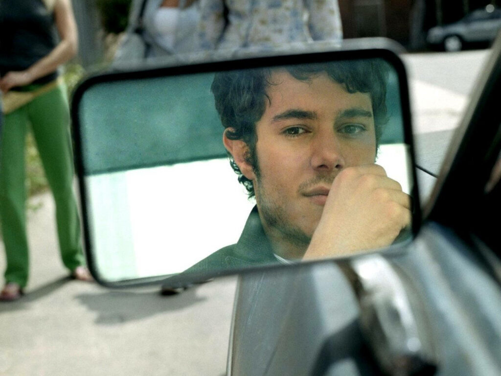 Adam Brody reflective portrait through car side mirror cinematic wallpaper background