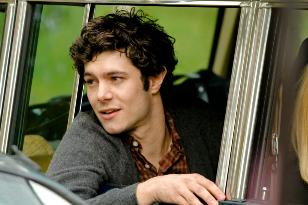 Adam Brody gazing thoughtfully out car window relaxed candid wallpaper background image