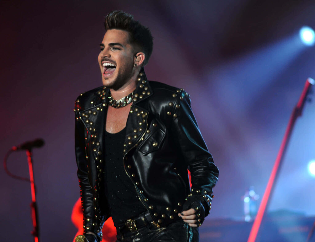 Adam Lambert performing live in studded black leather jacket with passionate energy wallpaper