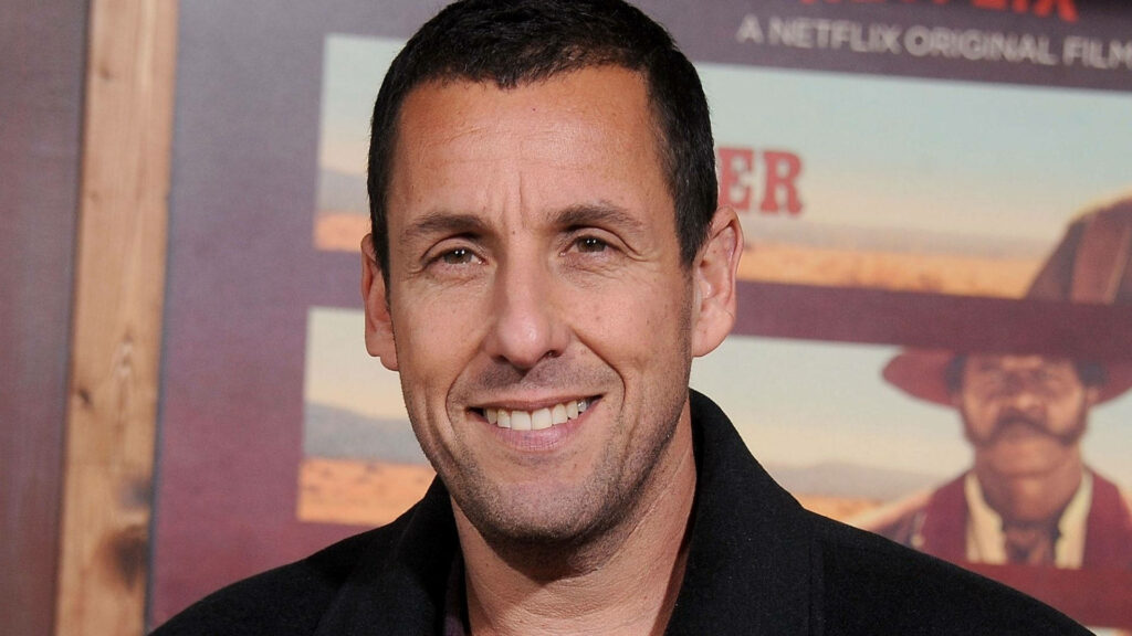 Adam Sandler smiling at film premiere wallpaper capturing charismatic and approachable actor