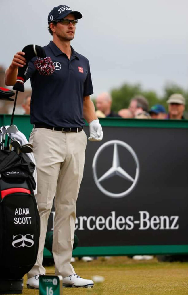 Adam Scott golfer on course near Mercedes-Benz sign with golf club and personalized bag wallpaper