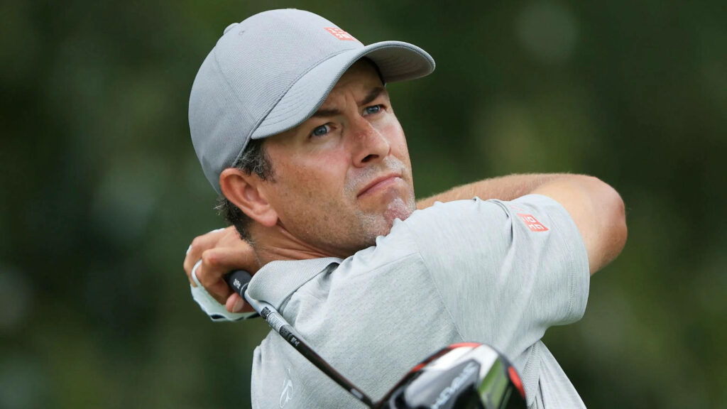Adam Scott golf swing mid-motion on course smooth technique wallpaper background image