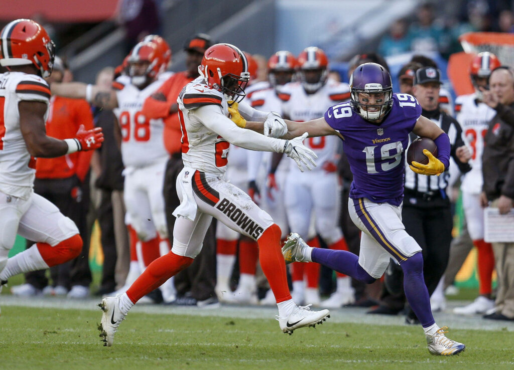 Adam Thielen in Action: Skillful Play Wallpaper Background