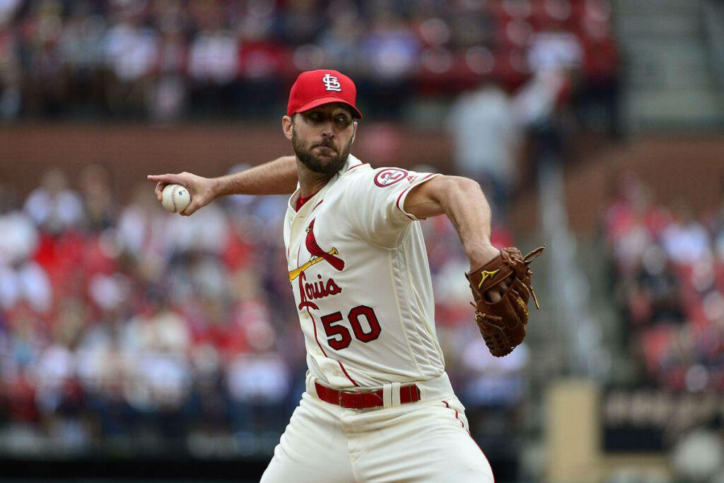 Adam Wainwright in red cap pitching baseball game St Louis Cardinals focused determined Wallpaper