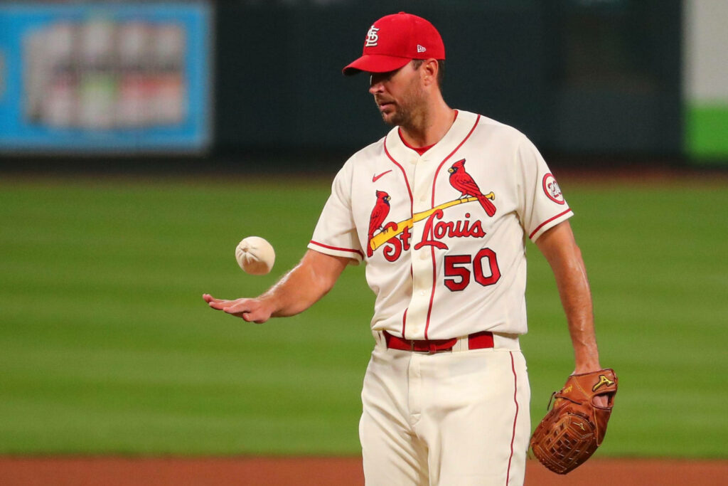 Adam Wainwright St Louis Cardinals pitcher on mound holding rosin bag preparing to pitch Wallpaper