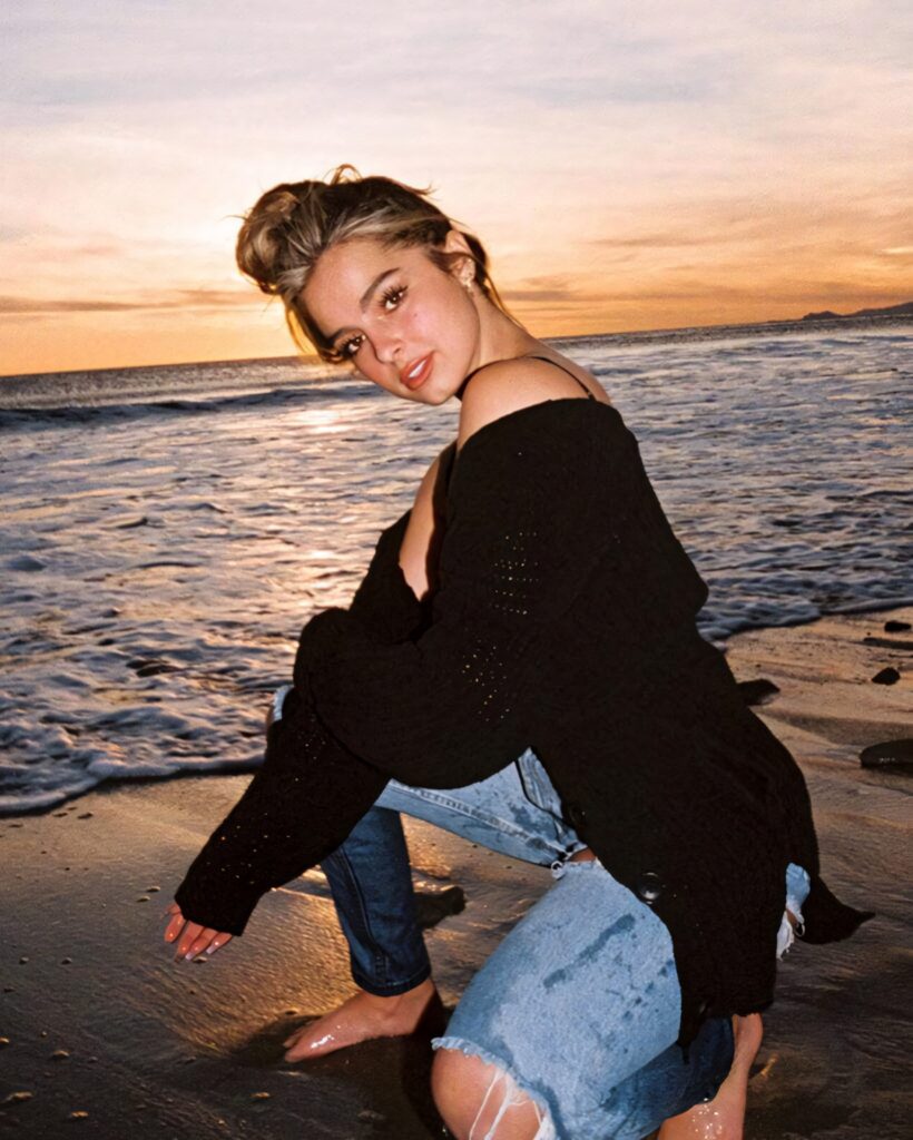 Stunning Beach Sunset Wallpaper of TikTok Star Addison Rae
