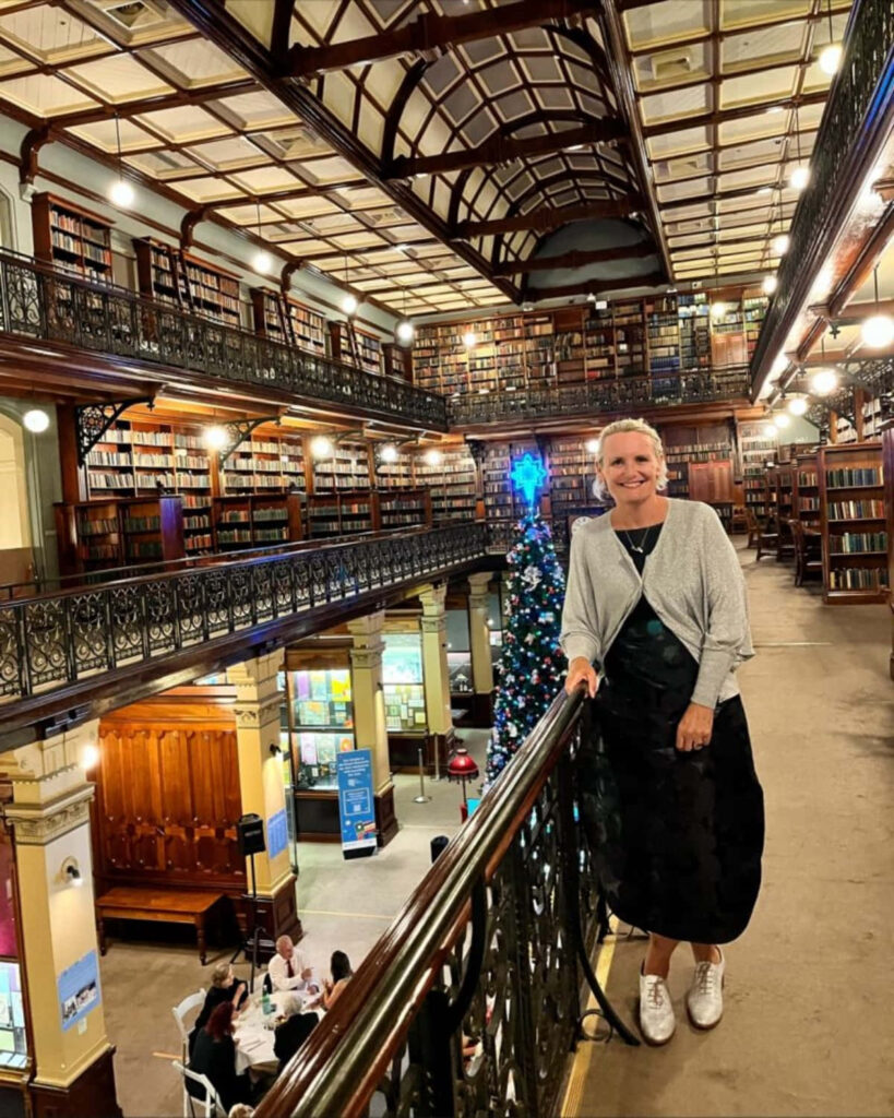 Adelaide State Library grand interior decorated for Christmas with tree festive lights and classic architecture Wallpaper