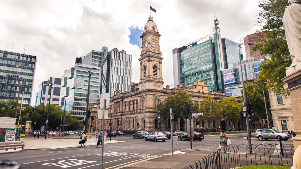 Adelaide Town Hall with modern city buildings at Victoria Square vibrant heritage and architecture Wallpaper