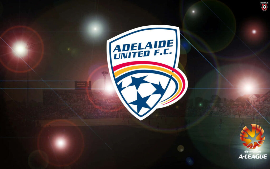 Adelaide United FC crest with vibrant stadium lights showing action-packed A-League match atmosphere Wallpaper