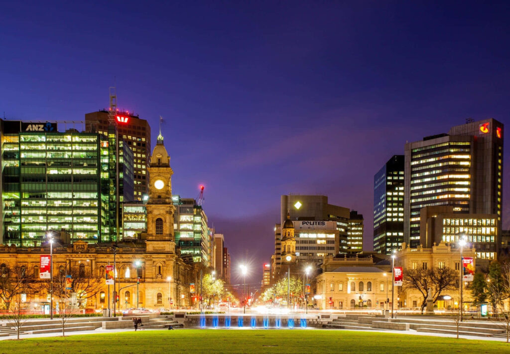 Victoria Square Adelaide night skyline with illuminated historic buildings and city lights wallpaper