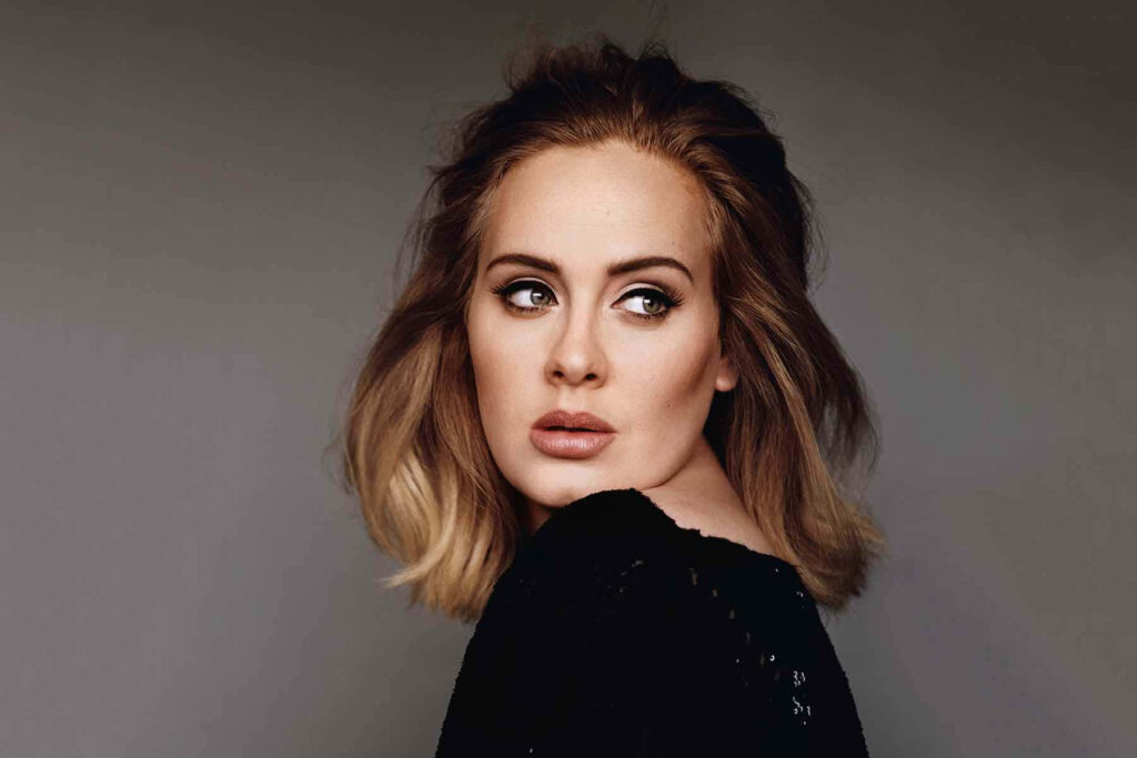Adele's Elegant Wallpaper: Captivating Pose & Signature Style